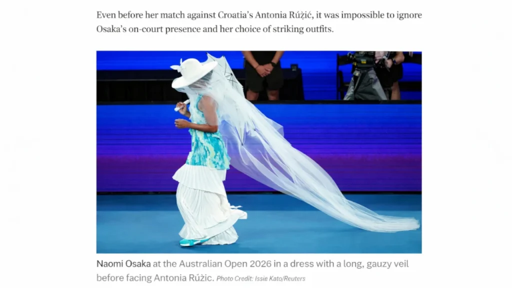Naomi Osaka walking on court at the Australian Open 2026 wearing a jellyfish-inspired outfit with a flowing veil